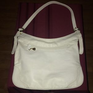 BRIO designer white leather handbag w gold tone accents, cream velvet interior.
